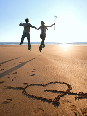 couple-on-beach-heart-in-sand-1-1109-mdn